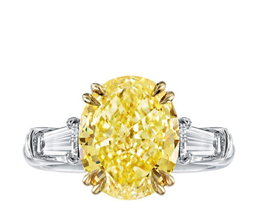 Oval Cut Fancy Yellow Diamond with Baguettes Ring