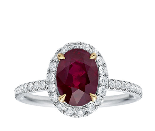 Oval Cut Ruby and Diamond Halo Ring