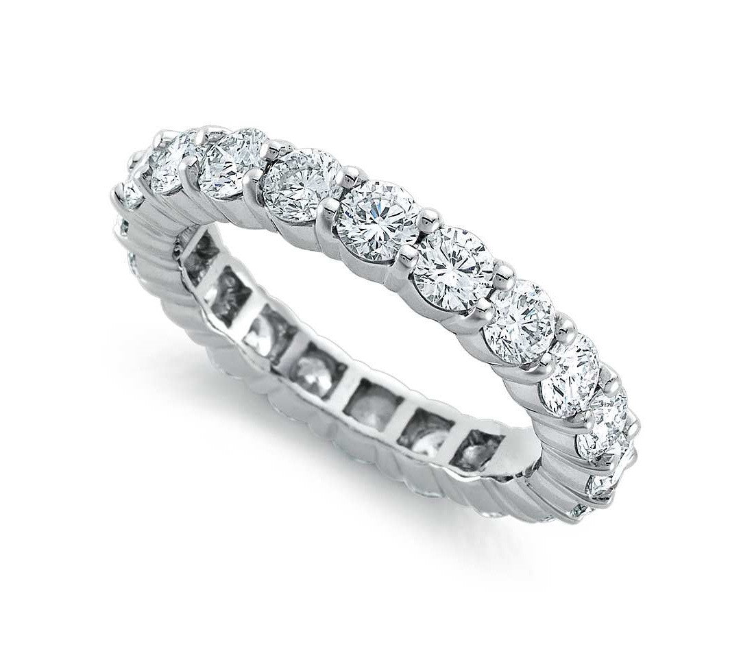 Round Brilliant Claw Set Eternity Band