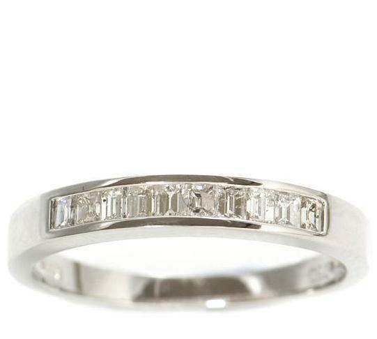 Over 1/2 Carat of Baguette channel set Diamond Ring in 18kt White gold