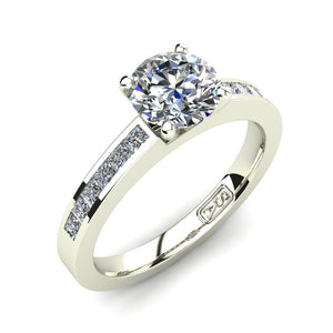 Platinum, Solitaire Setting with Channel set Accent Stones