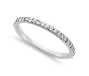 Round Brilliant Shared Claw Eternity Band