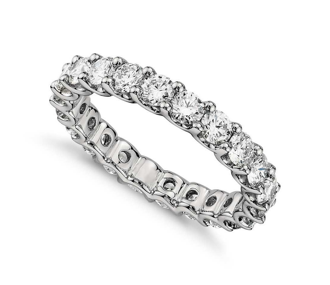 Round Brilliant Large Claw Set Eternity Band